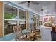Inviting front porch with rocking chairs, ceiling fans, and views of the neighborhood at 230 Ryan Ln, Covington, GA 30014