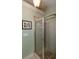 Shower with a glass door and tiled walls in the bathroom at 230 Ryan Ln, Covington, GA 30014