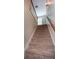 Carpeted staircase with wooden handrail leads to the upper level of the home at 230 Ryan Ln, Covington, GA 30014