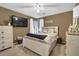Bedroom featuring hardwood flooring, natural light and ceiling fan at 4410 Red Rock Pt, Suwanee, GA 30024