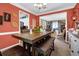 Charming dining room with easy access to living area, great for Gathering dinners and social gatherings at 4410 Red Rock Pt, Suwanee, GA 30024