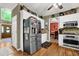 Bright and airy kitchen with stainless steel appliances and hardwood floors at 4410 Red Rock Pt, Suwanee, GA 30024