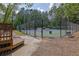 Well-maintained community tennis courts, perfect for recreational play and exercise at 4410 Red Rock Pt, Suwanee, GA 30024