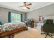 Comfortable bedroom with natural light at 931 Windsor Creek Dr, Grayson, GA 30017
