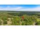 Bird's eye view of a home nestled in a green, tree-filled neighborhood at 4181 Singing Post Ne Ln, Roswell, GA 30075