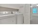 The laundry room features a washer and dryer at 4181 Singing Post Ne Ln, Roswell, GA 30075