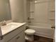 Bathroom featuring a tub and shower combination and single sink vanity at 93 Riverwood Dr, Dallas, GA 30157