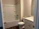 Bright bathroom with a tub and shower combination and laminate floors at 93 Riverwood Dr, Dallas, GA 30157