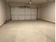 Spacious garage with ample room for parking and storage at 93 Riverwood Dr, Dallas, GA 30157