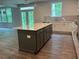 Stylish kitchen showcases a center island, two-tone cabinets, and modern fixtures at 93 Riverwood Dr, Dallas, GA 30157