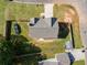 Aerial view of a house surrounded by a well-maintained lawn and a fenced backyard at 119 Sourwood Lane, Temple, GA 30179