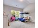 Bright bedroom with a large window and vaulted ceiling at 119 Sourwood Lane, Temple, GA 30179