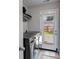 Laundry room featuring a washer and dryer and door leading to the backyard at 119 Sourwood Lane, Temple, GA 30179