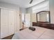 Bedroom including closet space, hardwood floors and large windows for natural lighting at 1390 Almont Sw Dr, Atlanta, GA 30310
