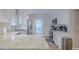 Well-equipped kitchen featuring white cabinets, granite countertops, stainless steel appliances, and hardwood floors at 1390 Almont Sw Dr, Atlanta, GA 30310