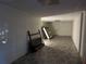 Spacious basement with wood look flooring, offering potential for customization and additional living space at 350 Rams Way, Tucker, GA 30084