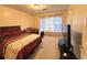 Bedroom with plush carpets, and large windows, offering a cozy and inviting atmosphere at 350 Rams Way, Tucker, GA 30084