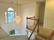Grand foyer showcasing a stunning chandelier and a view of the bright, welcoming entrance at 350 Rams Way, Tucker, GA 30084