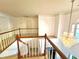 Bright foyer with chandelier, staircase, and view of entry showcasing the home's grand entrance at 350 Rams Way, Tucker, GA 30084