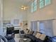 Spacious living room featuring high ceilings, built-in shelving, and plenty of natural light at 350 Rams Way, Tucker, GA 30084