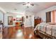 Spacious bedroom featuring hardwood floors, ample storage, and a convenient vanity area at 5022 Audubon Pl, Norcross, GA 30093