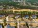 Neighborhood aerial view with golf course in the background, showcasing community features at 6213 Arnall Nw Ct, Acworth, GA 30101