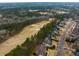 Community aerial view showcasing the neighborhood layout with lush greenery and golf course at 6213 Arnall Nw Ct, Acworth, GA 30101