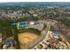 Community aerial view showcasing tennis courts, baseball field, and other recreational facilities at 6213 Arnall Nw Ct, Acworth, GA 30101