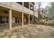 Spacious backyard patio with stone pavers and a view of the main house at 6213 Arnall Nw Ct, Acworth, GA 30101