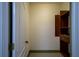 Empty walk-in closet with carpet flooring at 6213 Arnall Nw Ct, Acworth, GA 30101