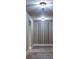 Hallway area featuring tile floors and custom shelving ready for beverages at 6213 Arnall Nw Ct, Acworth, GA 30101