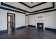 Living room offers hardwood floors, fireplace, and view to the kitchen, creating a warm and inviting atmosphere at 6213 Arnall Nw Ct, Acworth, GA 30101