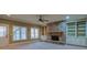Spacious living area with a beautiful stone fireplace and built-in bookshelves at 6213 Arnall Nw Ct, Acworth, GA 30101