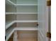 Large pantry offers ample shelving and storage space, keeping your kitchen organized and clutter-free at 6213 Arnall Nw Ct, Acworth, GA 30101