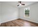 Simple bedroom with hardwood floors, a large window, and ample natural light at 3343 Mooring Dr, Powder Springs, GA 30127