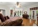 Large bedroom featuring hardwood floors, windows, and natural light at 3863 Streamside Se Dr, Marietta, GA 30067