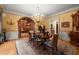 Formal dining room showcasing chandelier and views of staircase at 3863 Streamside Se Dr, Marietta, GA 30067