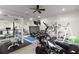 Fully equipped exercise room with modern equipment, mirrors, and ample space for fitness activities at 3863 Streamside Se Dr, Marietta, GA 30067