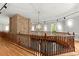 Grand foyer with wood trim and custom stonework at 3863 Streamside Se Dr, Marietta, GA 30067