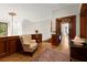 Upstairs hallway with hardwood floors and classic chair rail at 3863 Streamside Se Dr, Marietta, GA 30067