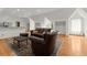 A comfortable living room with wood floors and large area rug at 3863 Streamside Se Dr, Marietta, GA 30067