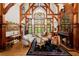 Bright and airy living room featuring high ceilings, exposed beams, and sophisticated decor at 3863 Streamside Se Dr, Marietta, GA 30067