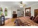 Beautiful main bedroom featuring hardwood floors and a cozy fireplace at 3863 Streamside Se Dr, Marietta, GA 30067