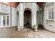 Stone patio with arched entryways offering an elegant outdoor living space at 3863 Streamside Se Dr, Marietta, GA 30067