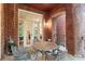 Brick patio features an outdoor dining area for entertaining at 3863 Streamside Se Dr, Marietta, GA 30067