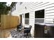 Deck with outdoor seating and privacy fence at 4970 Villager Ln, Stone Mountain, GA 30083