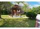 A gazebo in a grassy common area providing an outdoor recreational spot for residents at 4970 Villager Ln, Stone Mountain, GA 30083