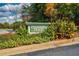 Entrance to Chimney Trace private residences, landscaped with colorful flowers at 507 Embers Se Dr, Marietta, GA 30067