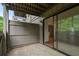 Enclosed patio with sliding glass doors that lead into the home's living area at 507 Embers Se Dr, Marietta, GA 30067