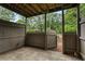 Private outdoor patio area with privacy fence and view of mature trees at 507 Embers Se Dr, Marietta, GA 30067